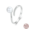 Women's S925 sterling silver adjustable ring with pearl detail and open loop design