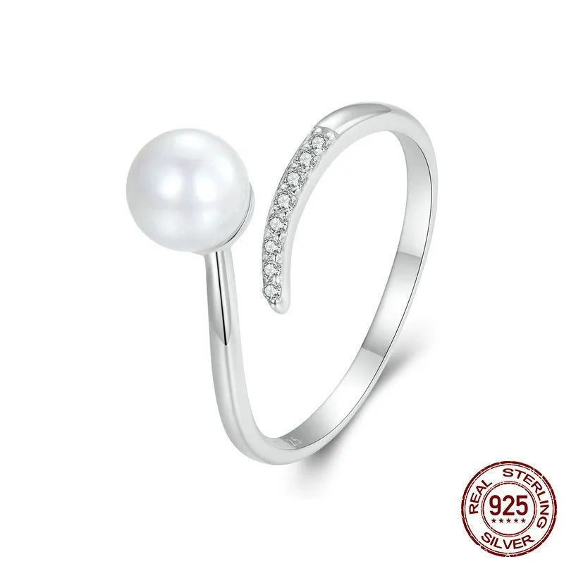 Women's S925 sterling silver adjustable ring with pearl detail and open loop design