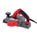 Red electric wood planer tool with aluminium shell showing 82mm cutting width