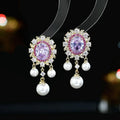 Oval geometric pearl tassel earrings with zircon stones in light purple colour