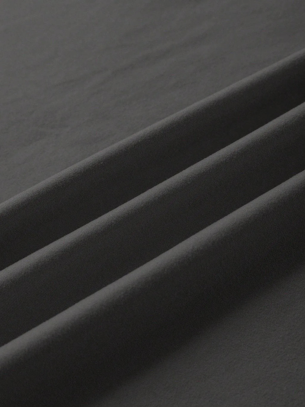 A straight-cut cotton T-shirt with short sleeves and a round neck, shown in one of the available colours.