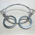 55cm stainless steel survival wire saw with pull rings and hoops on a green background.