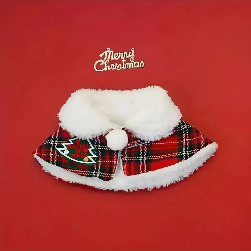 Red pet Christmas scarf with a jingle bell on a dog, showing the polyester fabric and festive design.