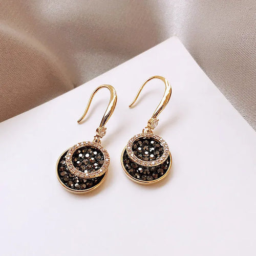 Black geometric drop earrings with circular design and 3.6cm length in retro Hong Kong style