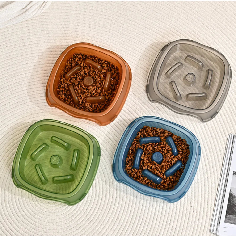 Plastic slow feeder dog bowl in blue, grey, green, and orange colour options