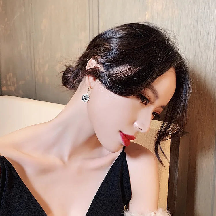 Black geometric drop earrings with circular design and 3.6cm length in retro Hong Kong style