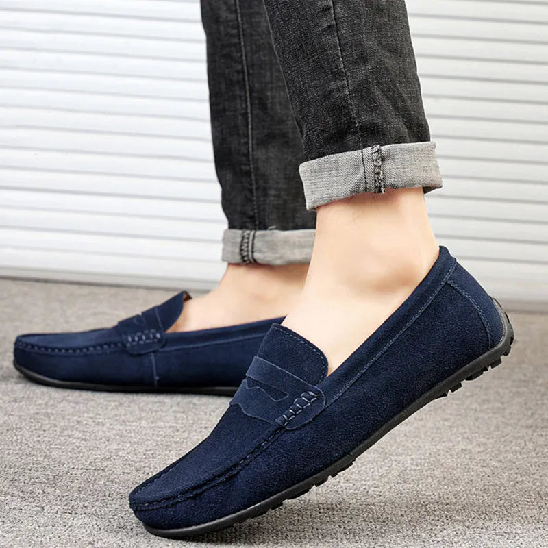 Men's suede leather slip-on loafers in various colours with a flat rubber sole and round toe