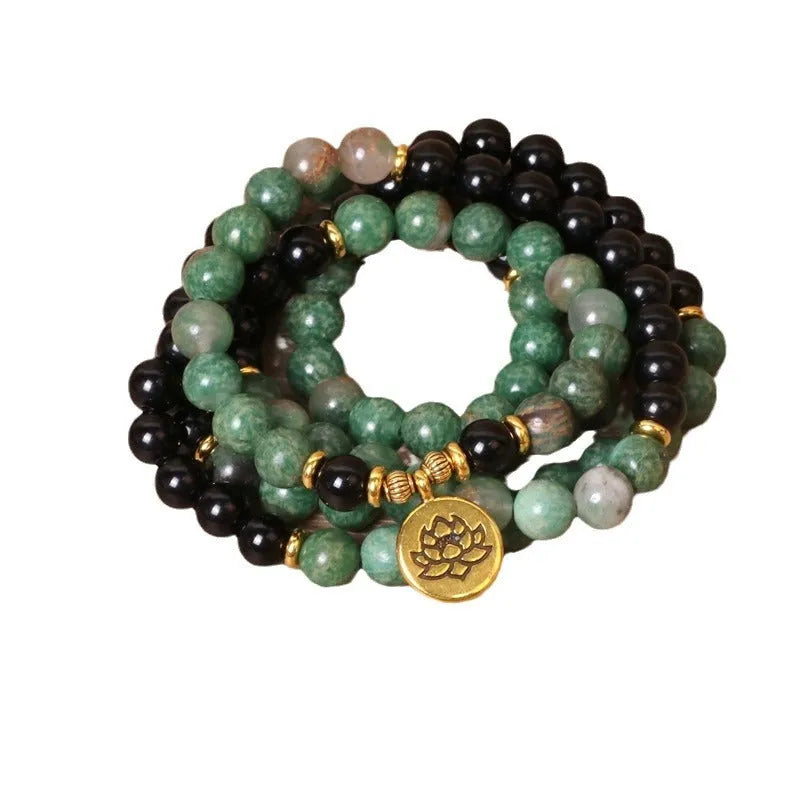 Green and black elastic beaded alloy bracelet with natural styling