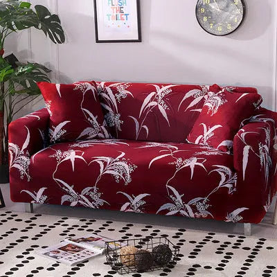 Printed stretch sofa cover with geometric pattern on three-seater sofa