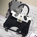 Ladies panda handbag in cow leather with animal print pattern available in two sizes