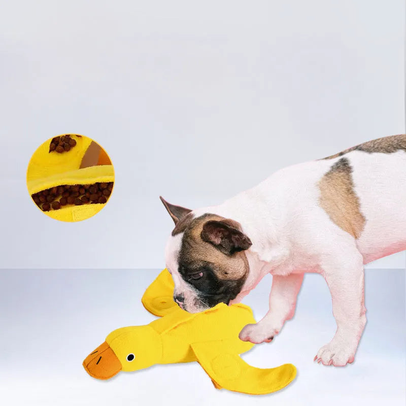 Yellow teddy dog toy with an attached duck doll, showing integrated food leak pockets for treats.