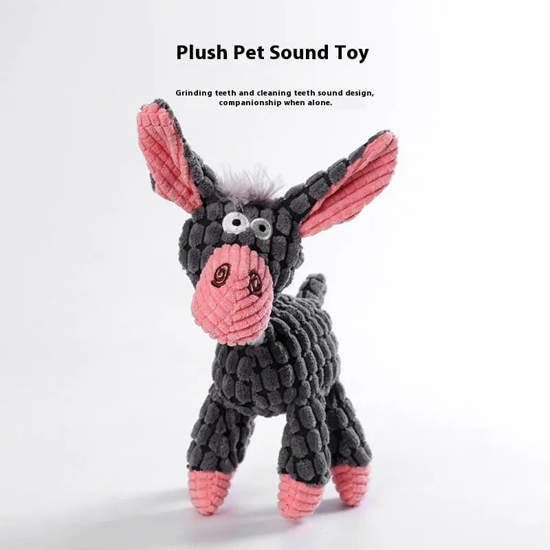 Assorted plush pet chew toys including a blue elephant, a duck, and a donkey in different colours
