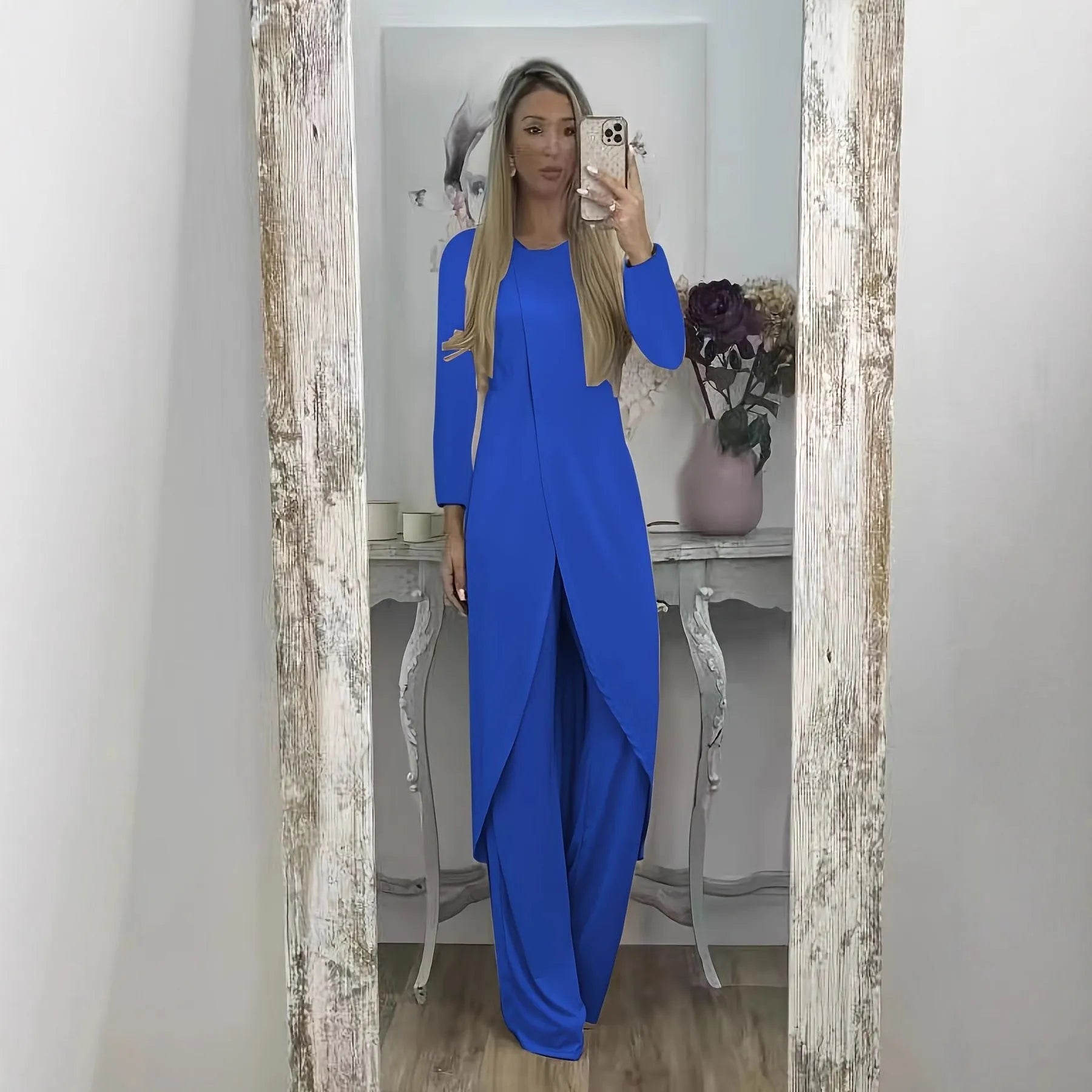 Casual black long sleeve round neck top and loose trousers two-piece lounge wear set.