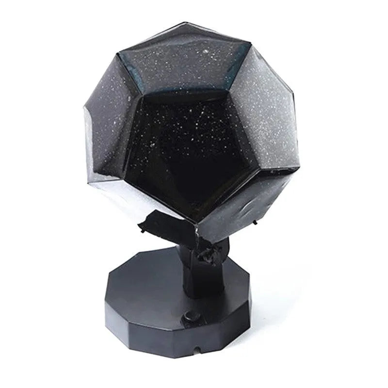 LED star projector night light showing constellation projection on a bedroom ceiling
