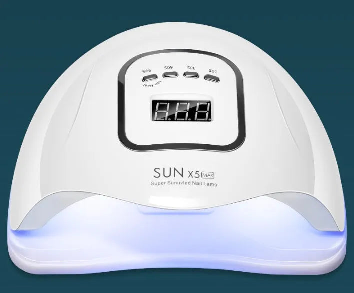 White nail polish curing lamp with UV and LED light sources for gel manicures