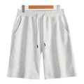 Cotton summer shorts in straight leg design showing micro-elastic fabric and fifth pants length