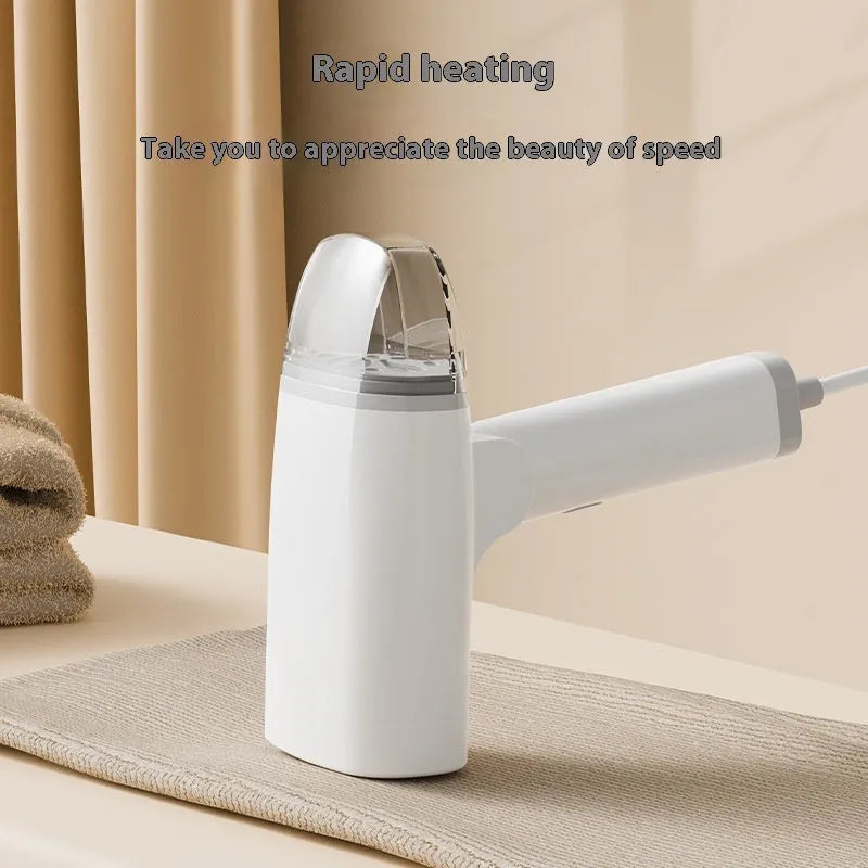 Blue and white handheld garment steamer with compact design and water tank for household clothes care