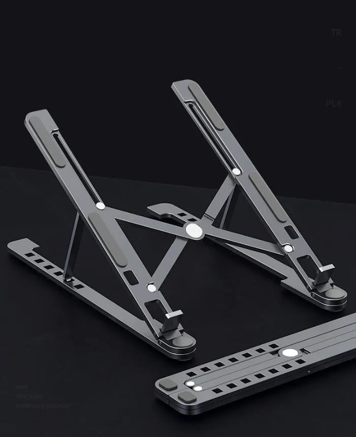 Foldable aluminium laptop stand in silver, shown open in use and closed for storage.