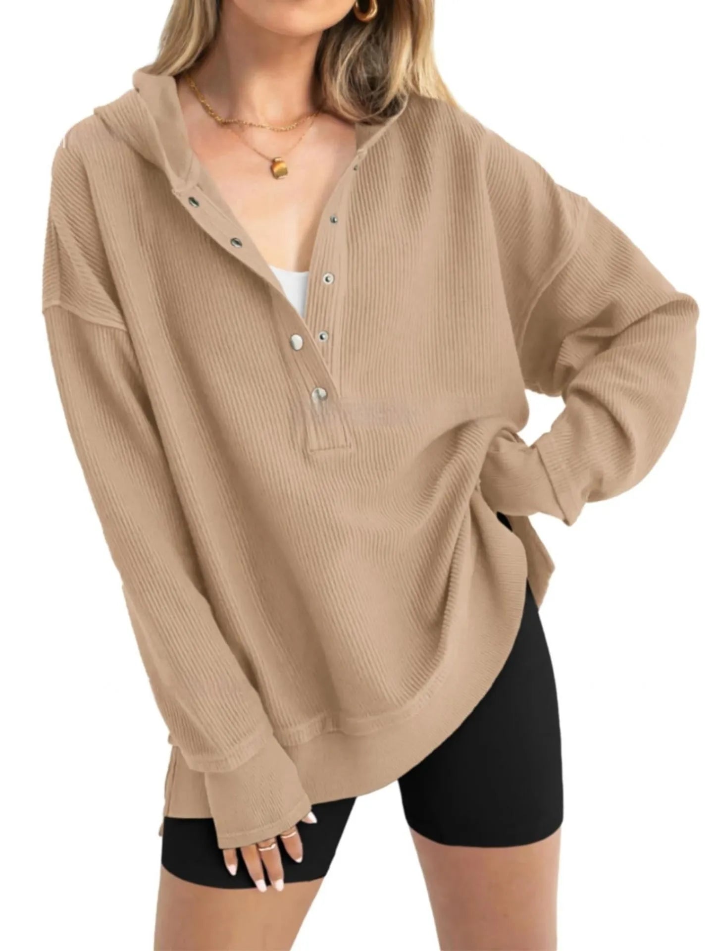 Women's loose fit peacock green raglan sleeve pullover sweater on a hanger.