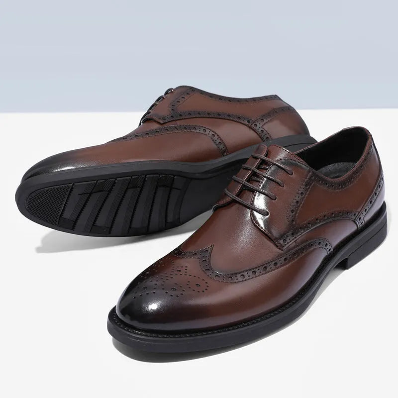 Men's black brogue leather shoes with traditional perforated detailing and lace-up design