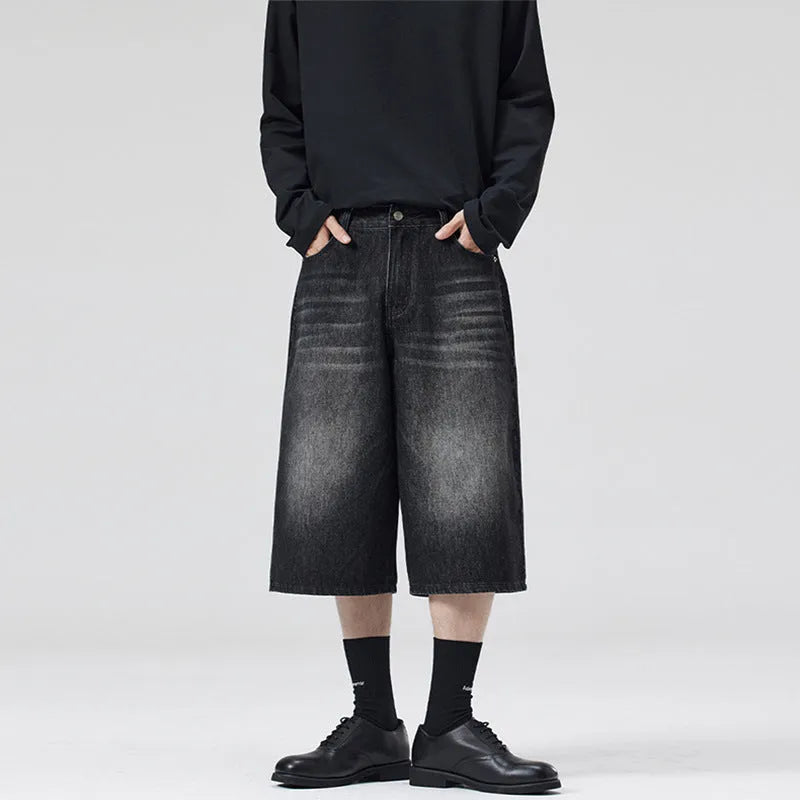 Men's light blue denim shorts with a straight leg and cropped length on a mannequin.