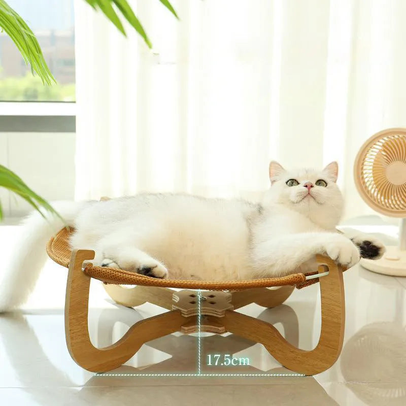 Brown rattan woven elevated pet bed measuring 46cm square with 17.5cm height