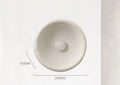 Japanese-style minimalist wall lamp with resin shade in three diameter options on modern interior wall