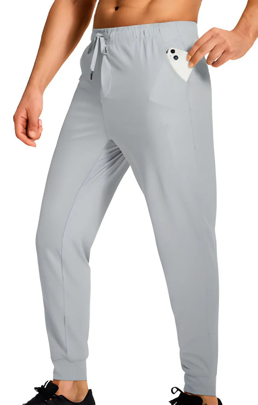 Men's loose fit casual polyester trousers in solid colour available in multiple sizes