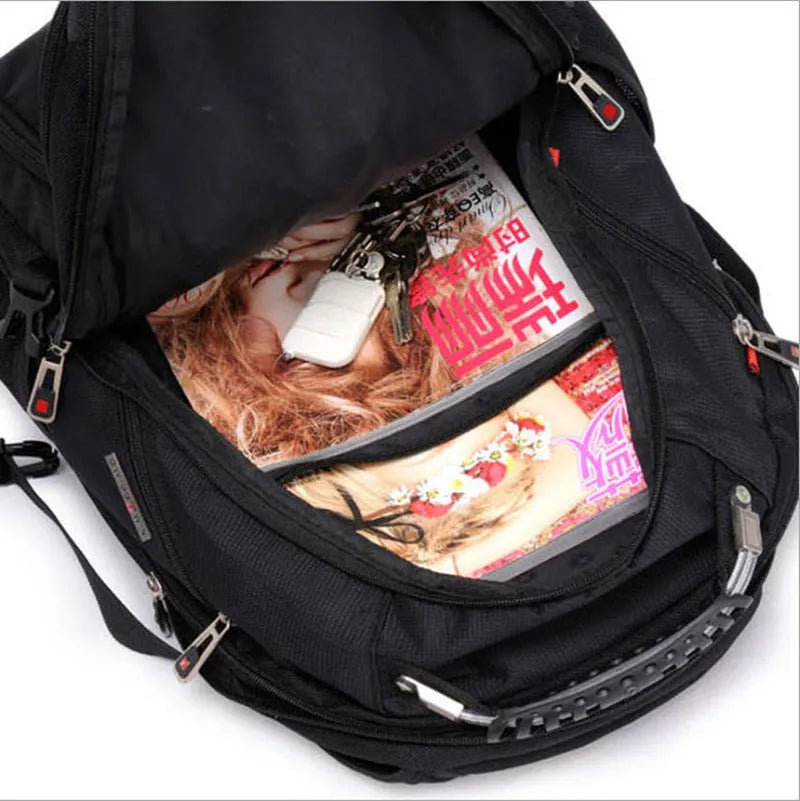 Black 38 litre business laptop backpack open to show three internal compartments for a computer, stationery, and storage.