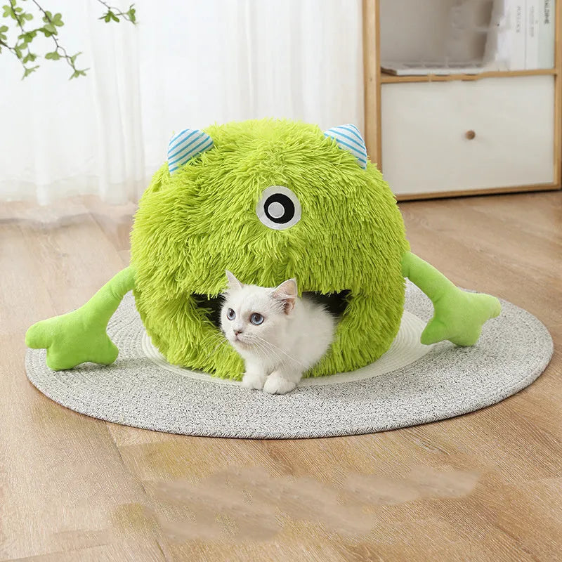 Fluffy round plush pet bed for cats and small dogs on a wooden floor