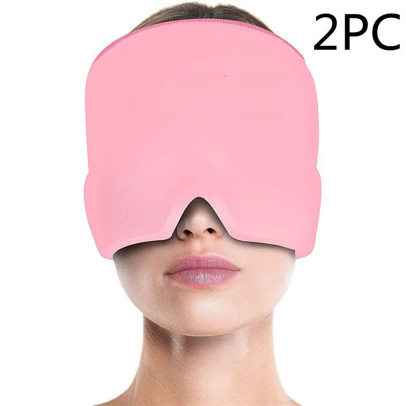 Black elastic cloth gel cold therapy eye mask for headache relief on grey background.