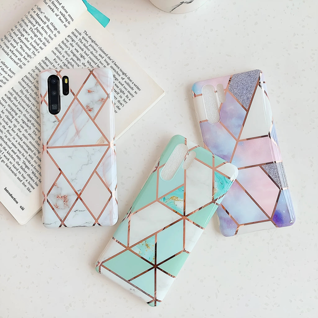 Glossy electroplated marble design TPU back cover case for a Huawei smartphone.