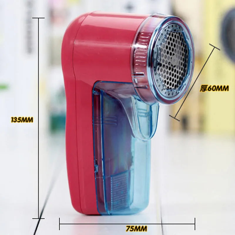 Portable electric lint remover for clothing on a white background