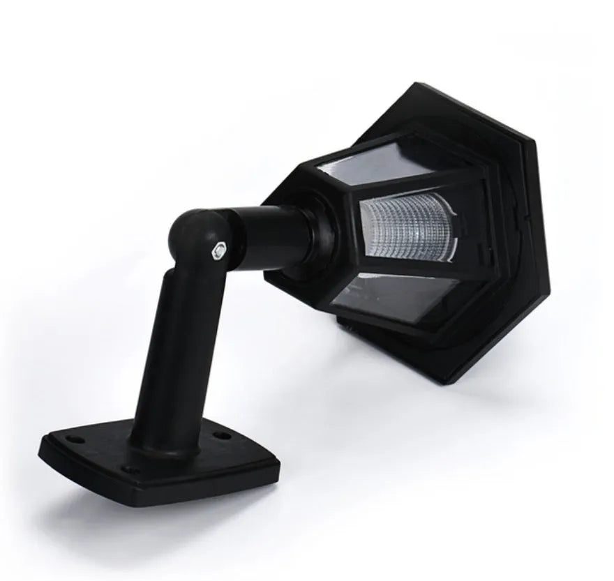 Black hexagonal solar wall lamp for outdoor garden and patio lighting