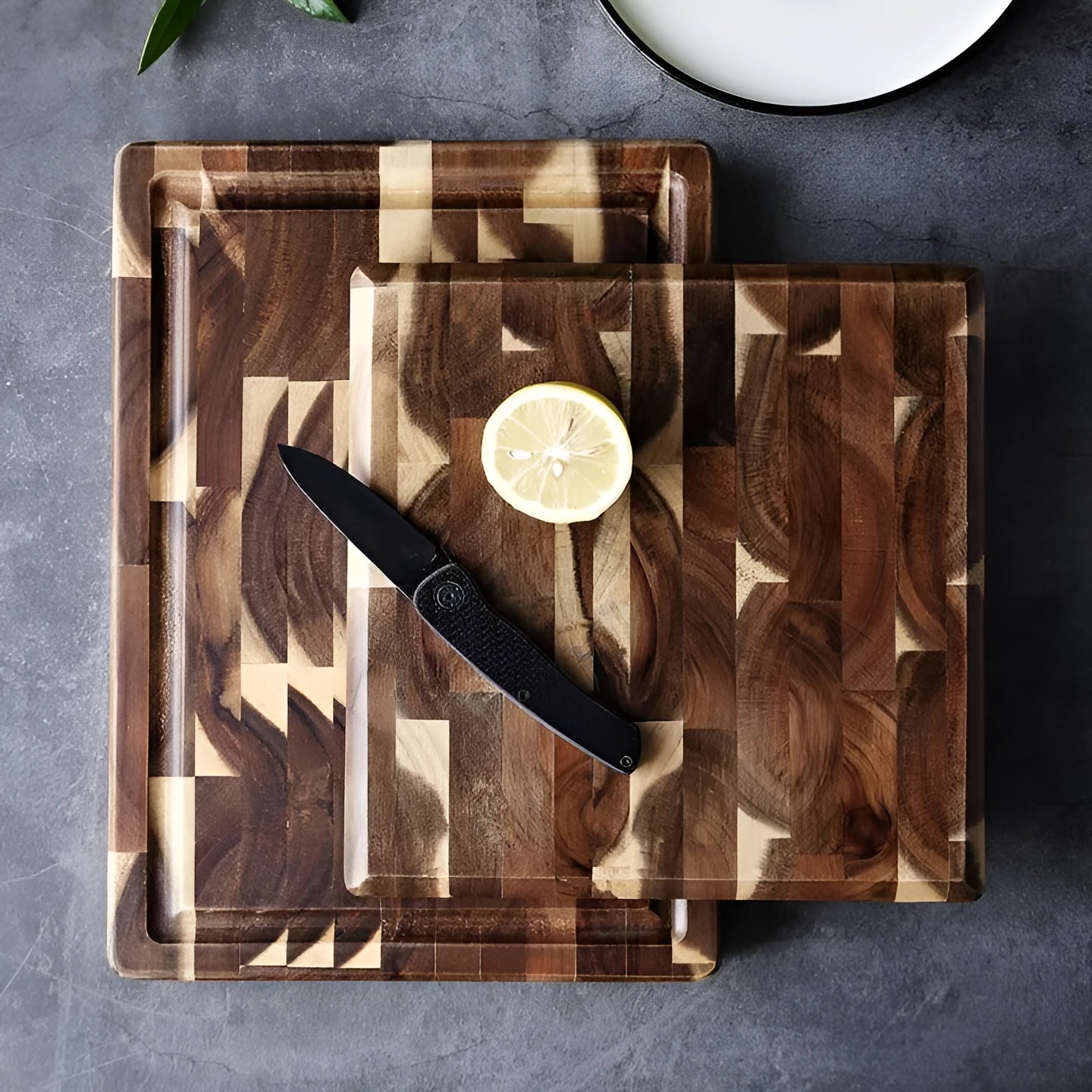 Brown imported acacia solid wood cutting board with 3cm thickness on kitchen counter