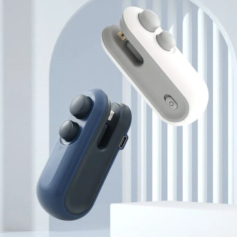 Blue handheld USB rechargeable heat sealer with magnetic back and cutter blade