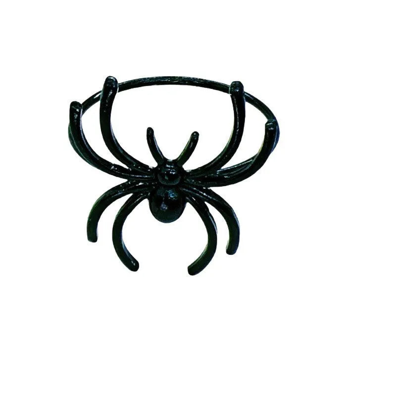 Six black alloy spider design napkin rings for Halloween table settings
