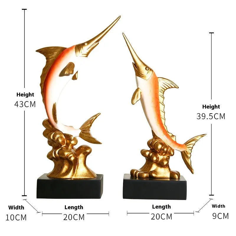 Close-up of a detailed resin European swordfish ornament in bright gold colour on a shelf.