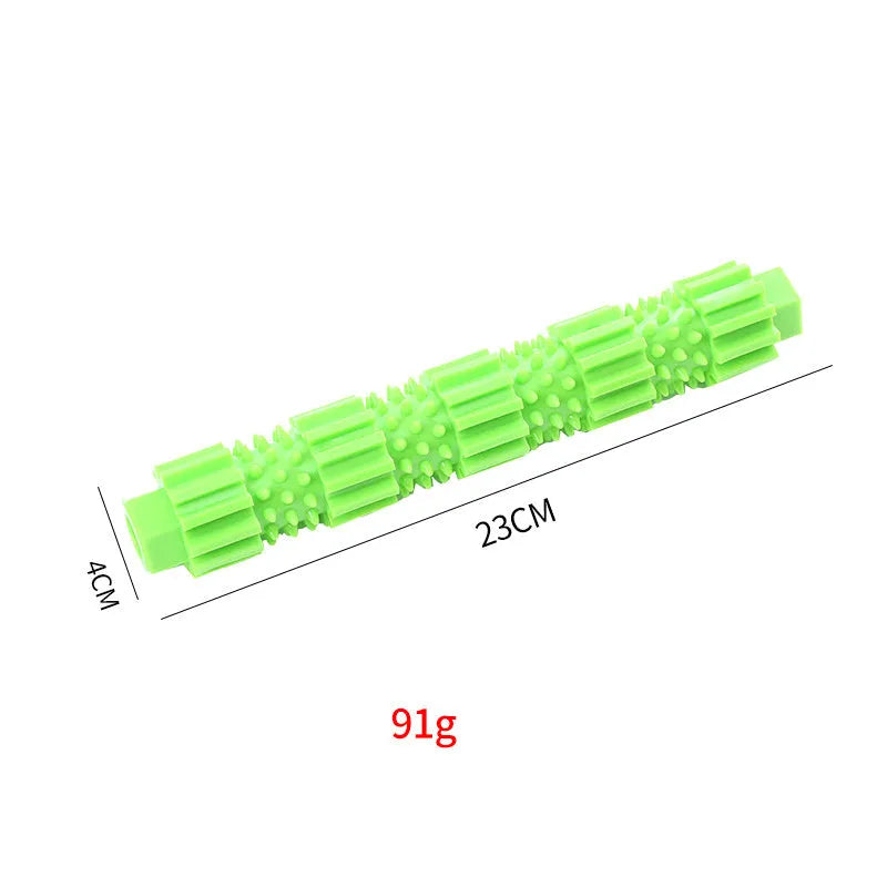 Green and orange durable rubber dog chew toy with treat-dispensing hole for aggressive chewers.
