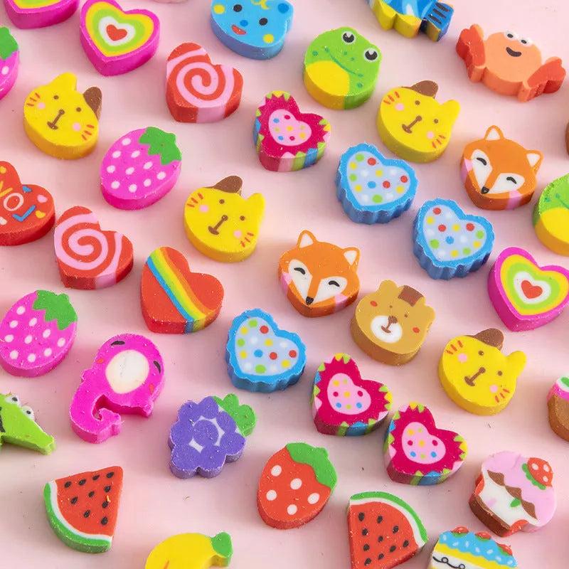 Assortment of 50 colourful cartoon mini erasers including fruits, animals, and themed shapes on a white background.