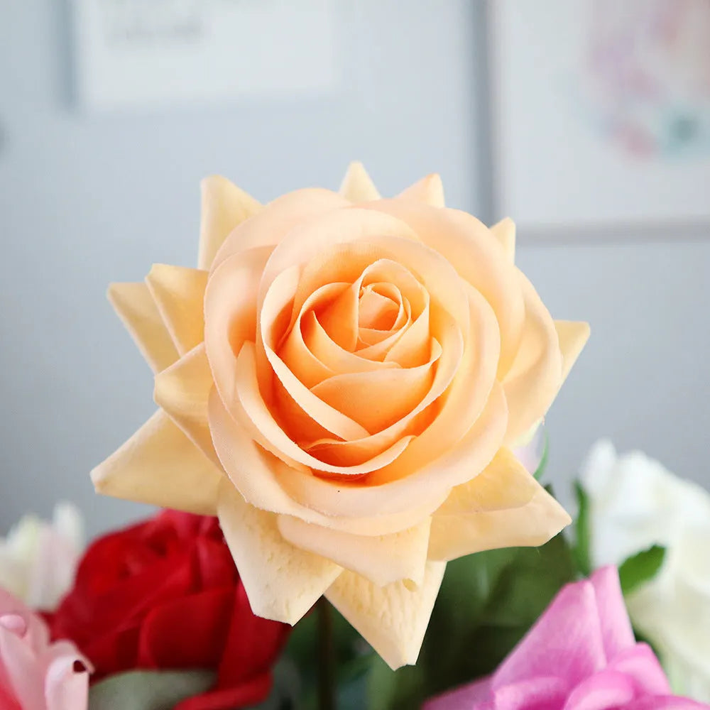 Silk artificial rose bouquet with 8.5cm flower heads in red, orange, white or purple fringe pink colours