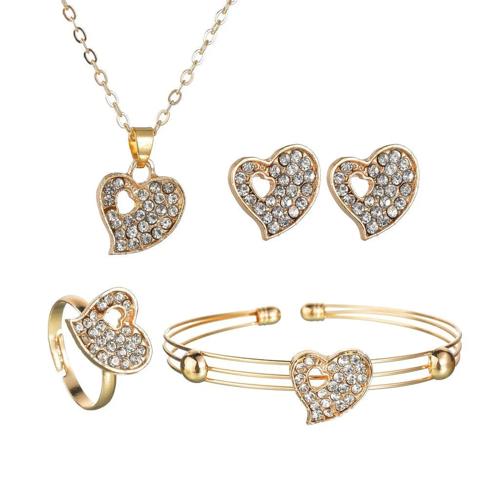 Gold-colour women's jewellery set with earrings, adjustable necklace and bracelet featuring heart, water drop and bell charms.