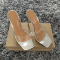Women's black and silver high heel boots with PVC soles in various UK sizes