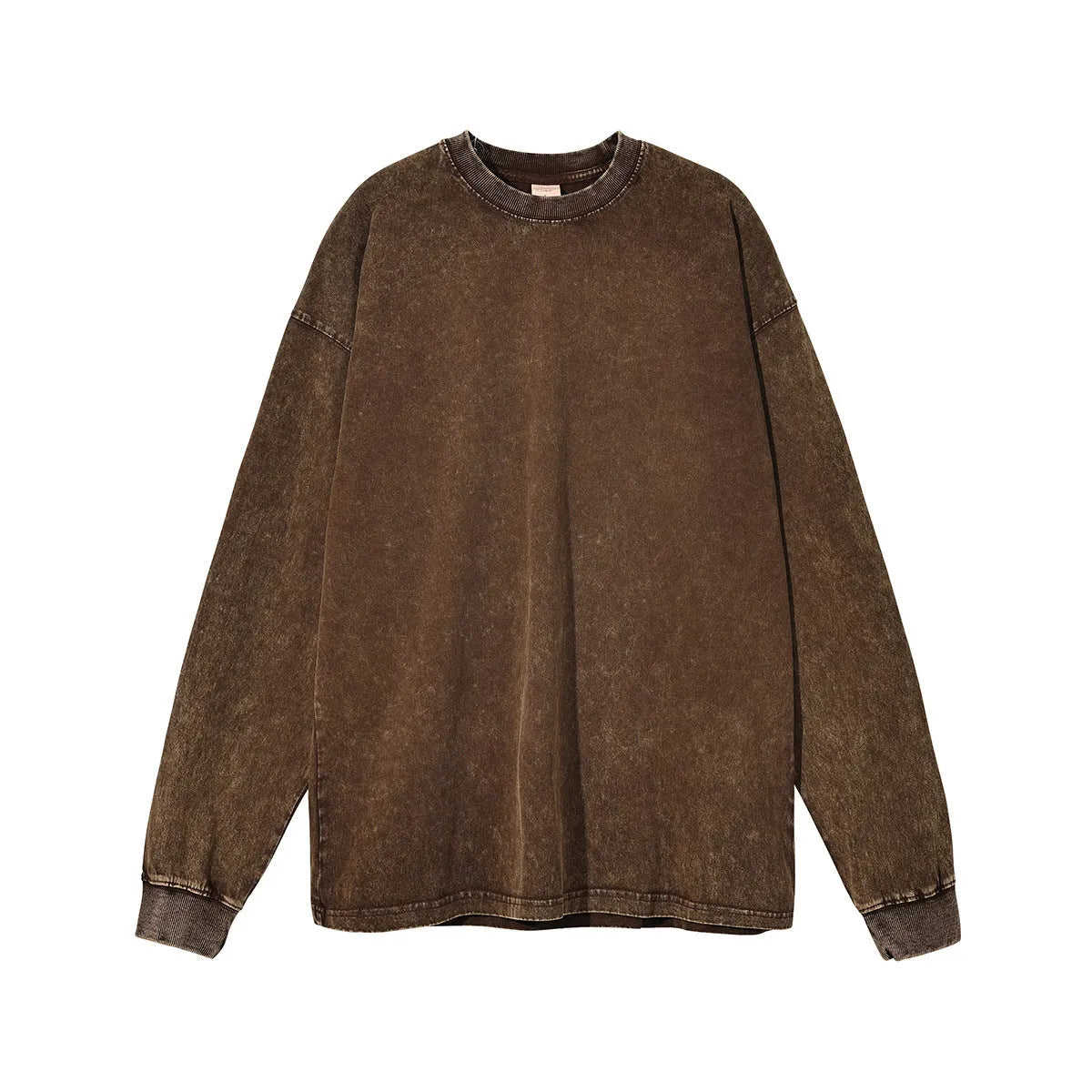 Man wearing a loose-fit, washed vintage long sleeve cotton pullover in a batik colour.