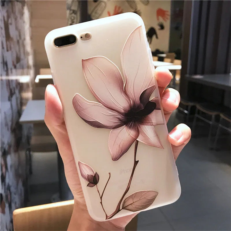 Embossed single flower design on black TPU iPhone case showing back cover protection
