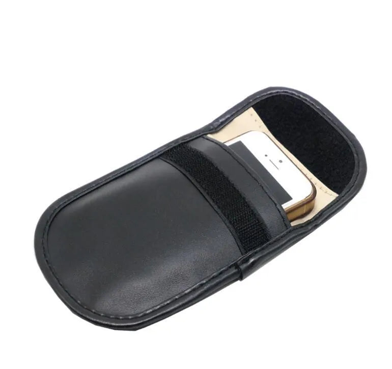 Black microfiber Faraday cage pouch for blocking car key and phone signals, sized 13.5 by 9.5 centimetres.