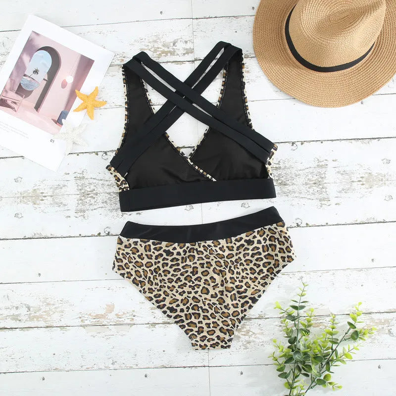 Leopard print women's bikini swimsuit with a V-neck top and cross banded detailing.