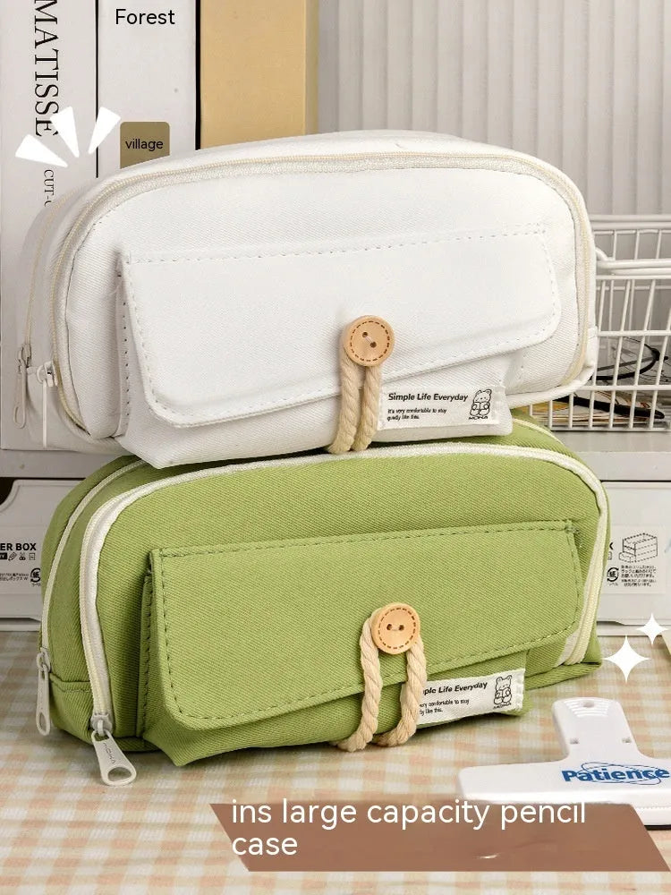 Canvas pencil case in green colour showing large capacity design for student stationery organisation