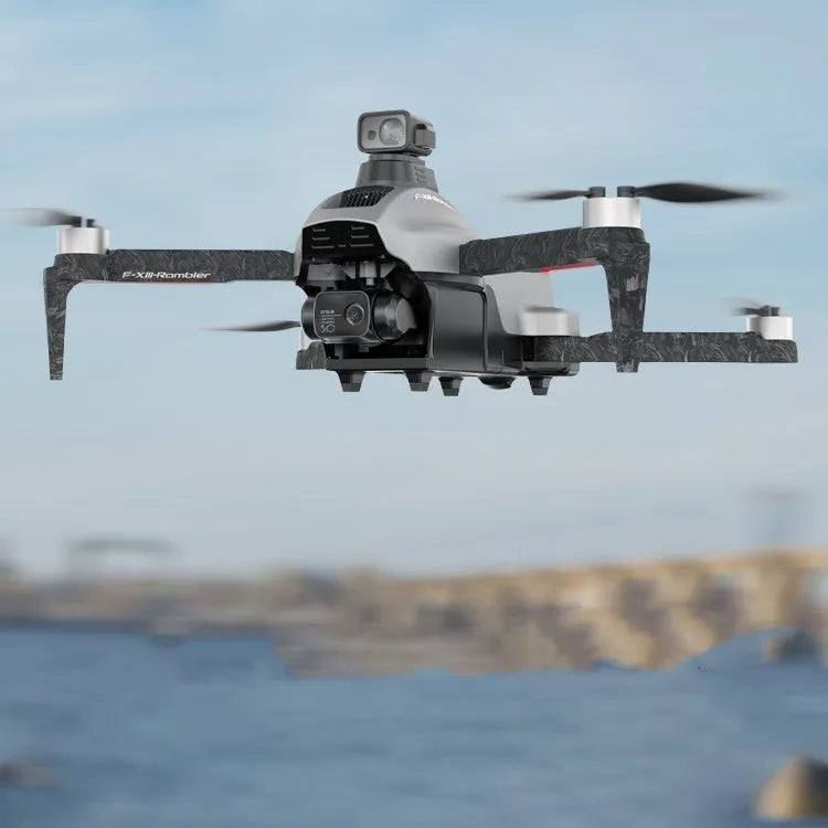 White folding quadcopter drone with camera and propeller guards on a remote control.