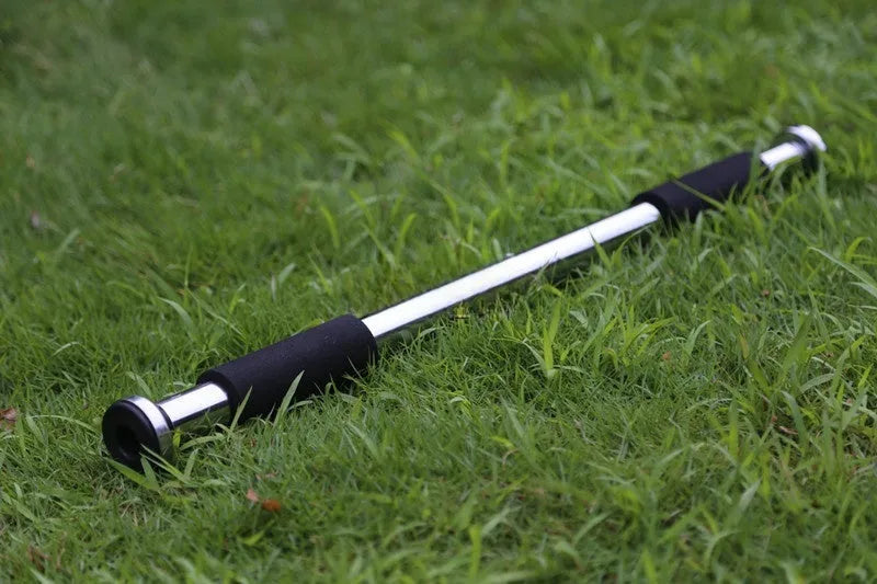Steel adjustable doorway pull-up bar extended to its maximum 100cm width.